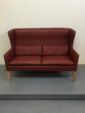 High back ox blood sofa